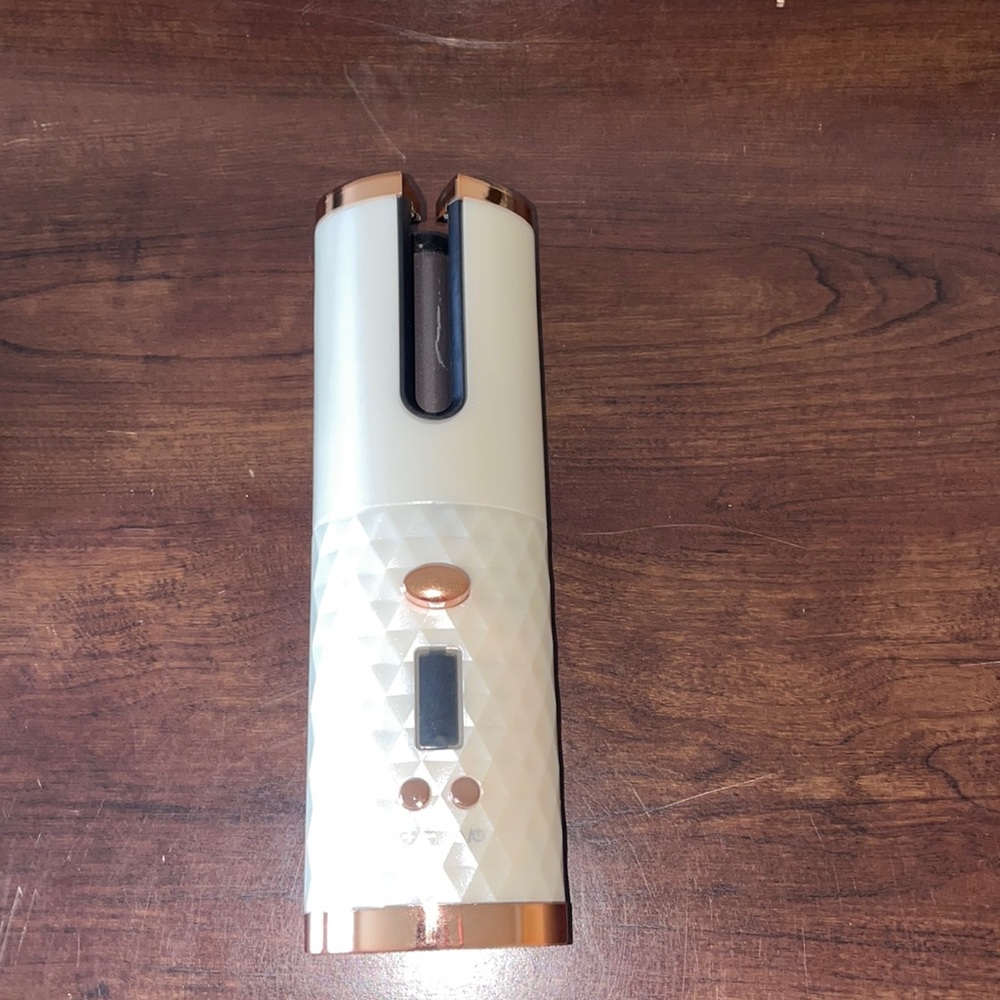 Portable hair curler! Never used.